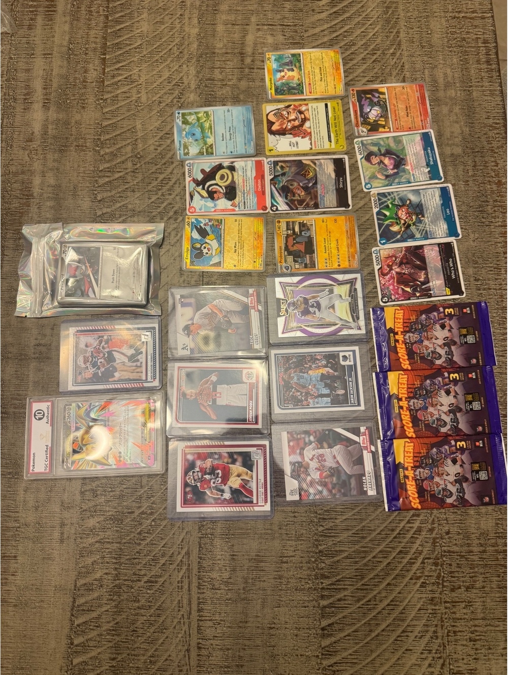 52 Pc Mixed Card Lot Pokemon One Piece Sports TGC Slab 3 Sealed NFL Packs